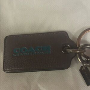 Coach Dark Purple Leather Keychain with Teal Logo